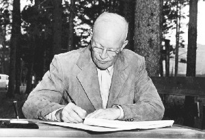 Eisenhower signing freeze bill